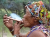 namibia-country-lodges-activity-smoking-pipe-by-women